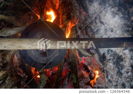 picnic in winter on nature of a bonfire picnic in winter on nature of a bonfire 126564546
