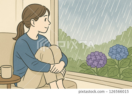 Woman by the window on a rainy day 126566015