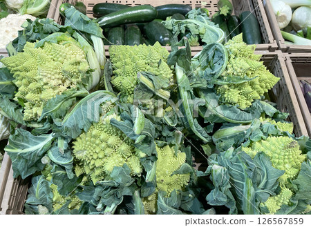 Decorative romanesco cabbage in box at market in Europe, Italy. Organic local food and health. Seasonal vegetables. 126567859