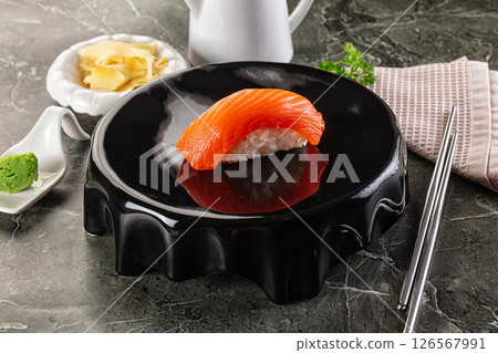 Japanese cuisine - sushi with salmon Japanese cuisine - sushi with salmon 126567991