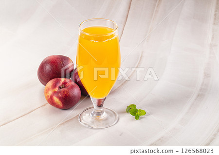 Vitamin beverage - peach juice glass Vitamin beverage - peach juice glass 126568023