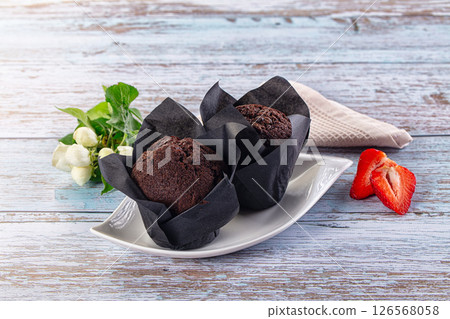 Sweet tasty chocolate muffin cupcake 126568058