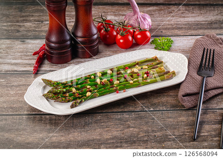 Grilled asparagus sprouts with cedar Grilled asparagus sprouts with cedar 126568094