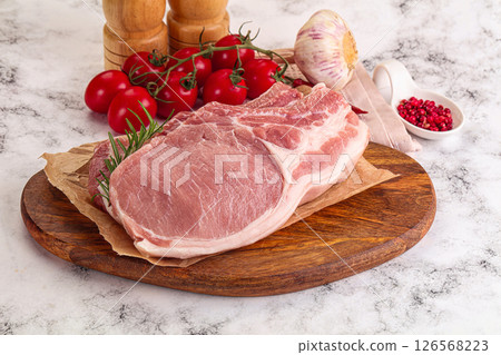 Raw potk loin steak with bone 126568223