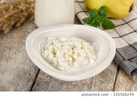 Grain cottage cheese with sour 126568249