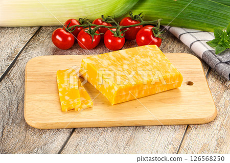 Marble yellow cheese with slices 126568250