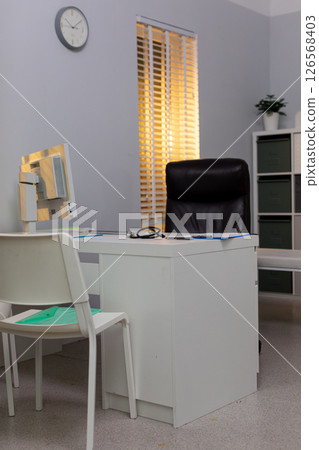 Modern Office Workspace with Minimalist Design and ample Natural Light for productivity 126568403