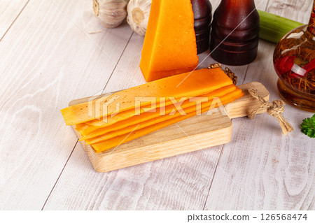 Yellow cheddae cheese slices snack 126568474