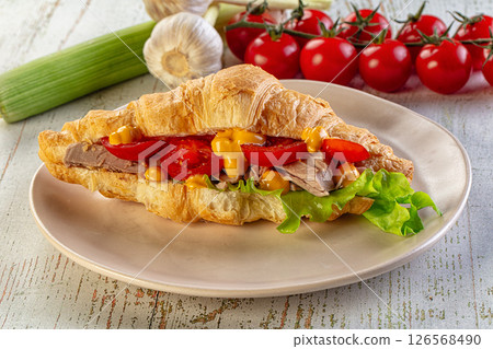 Croissant with tuna, tomato and salad 126568490
