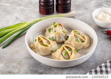 Uzbek cuisine - staffed Manti with meat 126568523