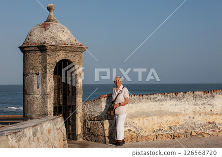 Active senior concept. Senior travel concept. Senior lifestyle. Senior woman tourist in Cartagena de Indias. 126568720