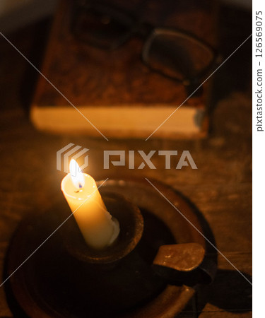 Candle Glowing in the Dark Candle Glowing in the Dark 126569075