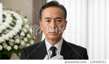 Portrait of a polite male staff member wearing white gloves (AI-generated image) 126569311