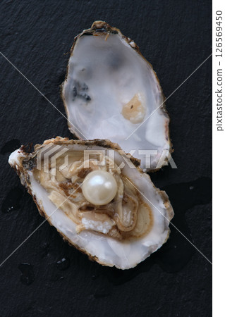 Oyster with the pearl of Isoliroano staged photography 126569450