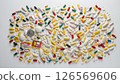 Top view: multi-colored pills, capsules and pills on a white background, pharmacy concept 126569606