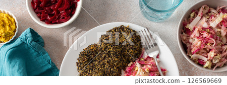 A well-balanced, wholesome breakfast made with quinoa pancakes, fresh greens, radishes, mung bean sprouts, eggs, hummus, and beets, offering protein, fiber, and energy, banner A well-balanced, wholesome breakfast made with quinoa pancakes, fresh greens, radishes, mung bean sprouts, eggs, hummus, and beets, offering protein, fiber, and energy, banner 126569669