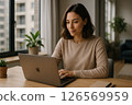Woman working remotely 126569959