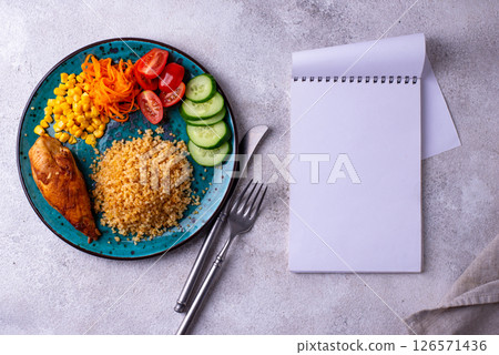 Healthybalanced food plate with chicken and vegetables 126571436