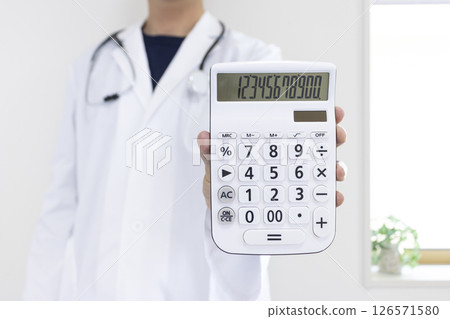 Image of a doctor holding a calculator (Japanese, male, no face, 30s) Image of a doctor holding a calculator (Japanese, male, no face, 30s) 126571580