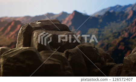 Remote mountain wilderness with rocky cliffs and sweeping vistas, offering a perfect escape into nature. The fresh air and scenic background create an ideal environment for adventure. Remote mountain wilderness with rocky cliffs and sweeping vistas, offering a perfect escape into nature. The fresh air and scenic background create an ideal environment for adventure. 126572407