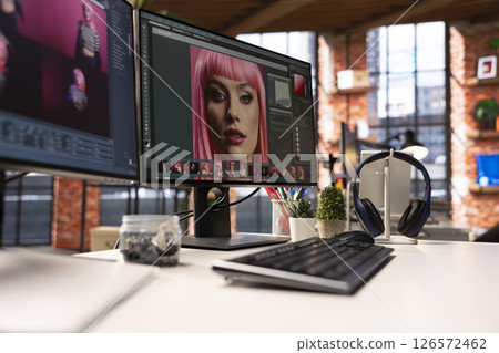 Professional studio setup for AI generated content and photography editing. Empty workspace with monitors displaying retouching software, supports creative careers in visual design. Professional studio setup for AI generated content and photography editing. Empty workspace with monitors displaying retouching software, supports creative careers in visual design. 126572462