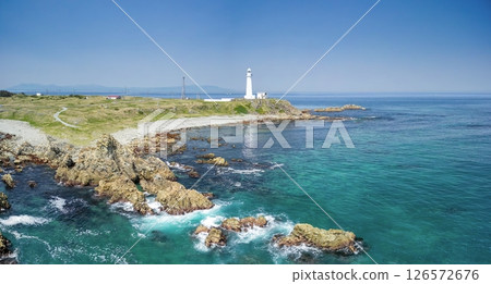Aerial view of Aomori Prefecture, the white Shiriyasaki Lighthouse at the northernmost tip of Honshu, Shimokita Peninsula Aerial view of Aomori Prefecture, the white Shiriyasaki Lighthouse at the northernmost tip of Honshu, Shimokita Peninsula 126572676