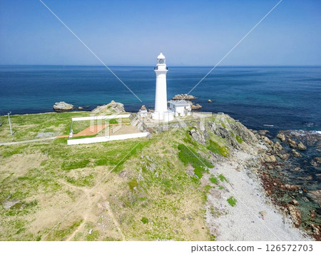 Aerial view of Aomori Prefecture, the white Shiriyasaki Lighthouse at the northernmost tip of Honshu, Shimokita Peninsula 126572703