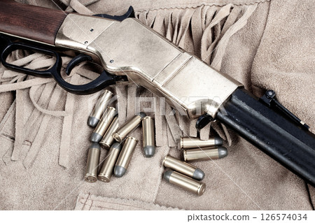 rifle with ammunition. 126574034
