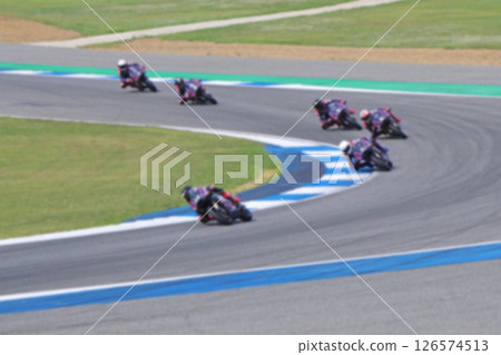 Blurred photo of Motorbike racing Blurred photo of Motorbike racing 126574513