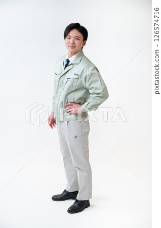 Male engineer in work clothes Male engineer in work clothes 126574716