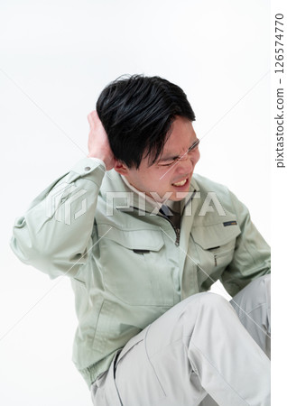 Male engineer in work clothes Male engineer in work clothes 126574770