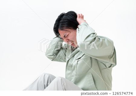 Male engineer in work clothes Male engineer in work clothes 126574774