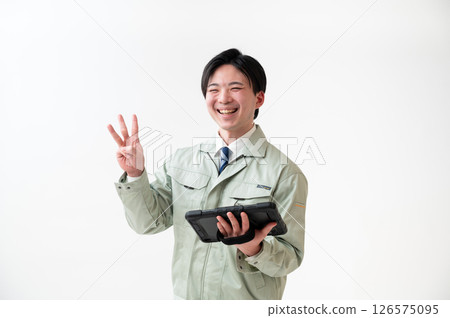 Male engineer in work clothes Male engineer in work clothes 126575095