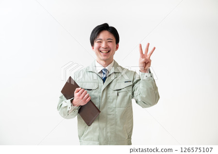 Male engineer in work clothes Male engineer in work clothes 126575107