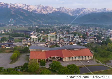 Hakuba Sanzan and Wing 21 in the early morning Hakuba Village, Nagano Prefecture (aerial shot by drone) 126575165