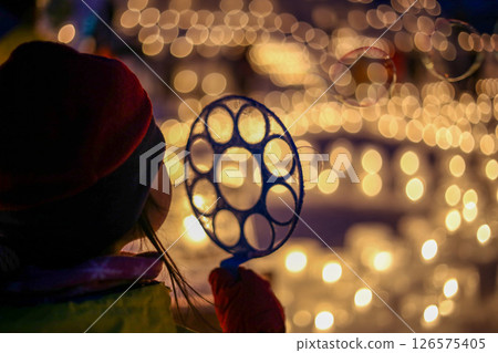 A child looking at the illuminations A child looking at the illuminations 126575405