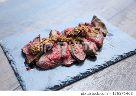 Roasted venison (game) Roasted venison (game) 126575408