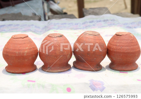 Clay made tree Pot for plant 126575993