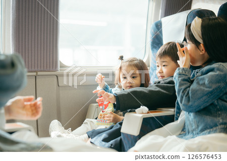 Children riding the Shinkansen 126576453