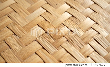 Natural bamboo and wicker weave texture creates a seamless brown pattern for floor or wall material Natural bamboo and wicker weave texture creates a seamless brown pattern for floor or wall material 126576770