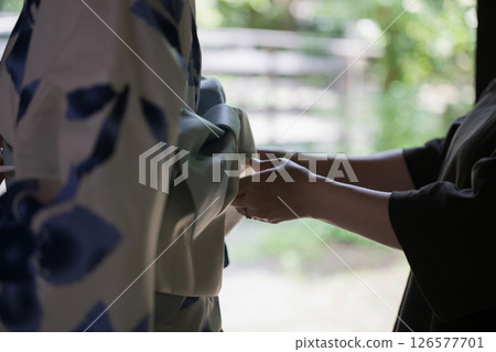 Dressing up in a yukata in a Japanese house 126577701