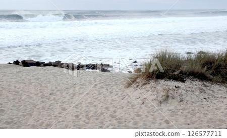 Furadouro Beach, Portugal, where strong Atlantic waves challenge coastal stability Furadouro Beach, Portugal, where strong Atlantic waves challenge coastal stability 126577711