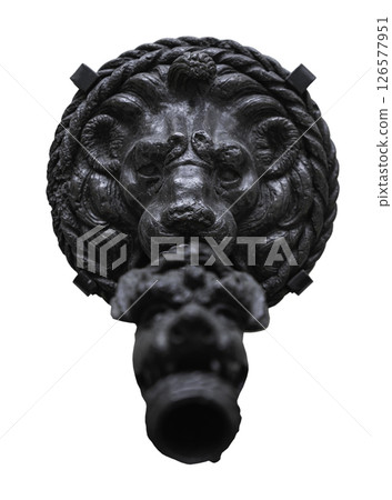 Part of a wall fountain with The lion held the beast in its mouth isolated on white background with clipping path. 126577951