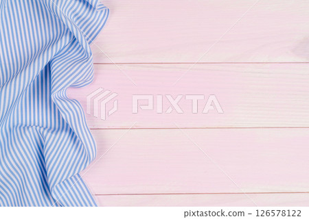 Blue towel over table Blue towel over table 126578122