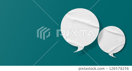 White speech bubble crumpled paper isolated on green background White speech bubble crumpled paper isolated on green background 126578256