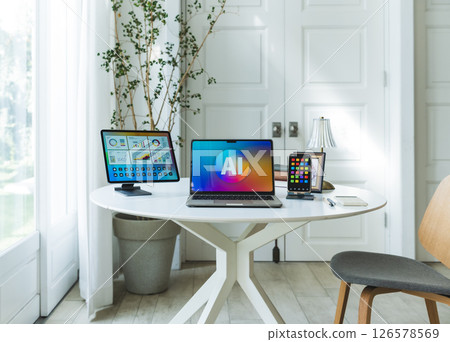 Table with electronic devices Table with electronic devices 126578569