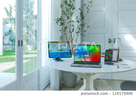 Table with electronic devices 126578906