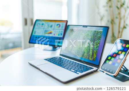 Table with electronic devices 126579121