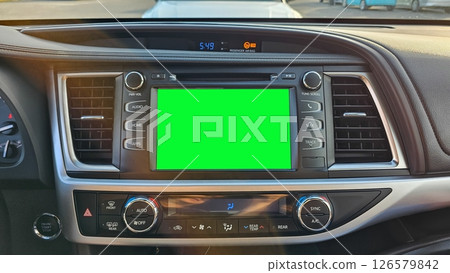 Car Dashboard Display with Green Screen for Mockup, Automotive Interior View 126579842