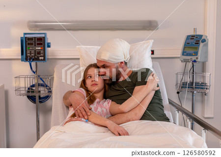An Emotional Hospital Scene Depicting a Child Comforting a Patient in a Vulnerable Moment An Emotional Hospital Scene Depicting a Child Comforting a Patient in a Vulnerable Moment 126580592